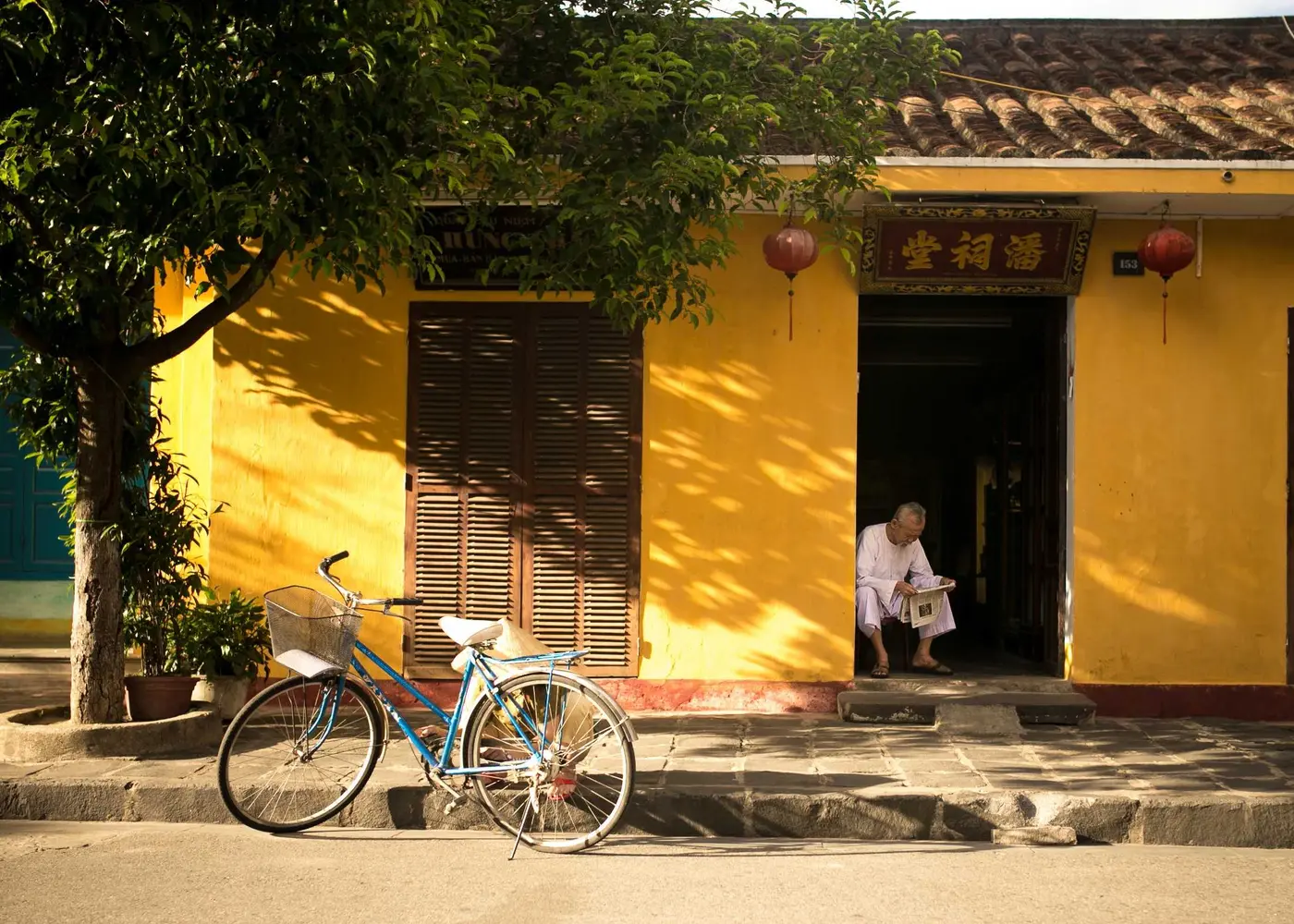 The yellow house with a bicycle